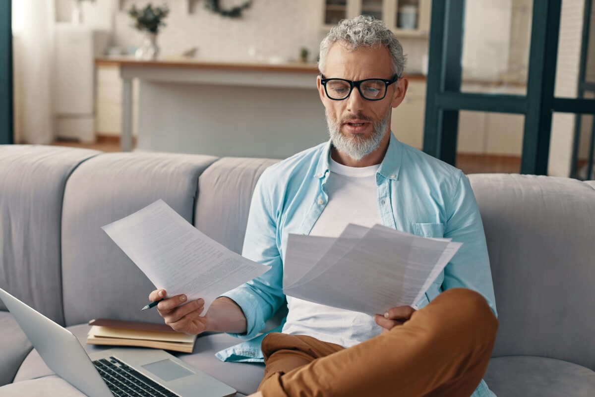 Man reviewing paperwork