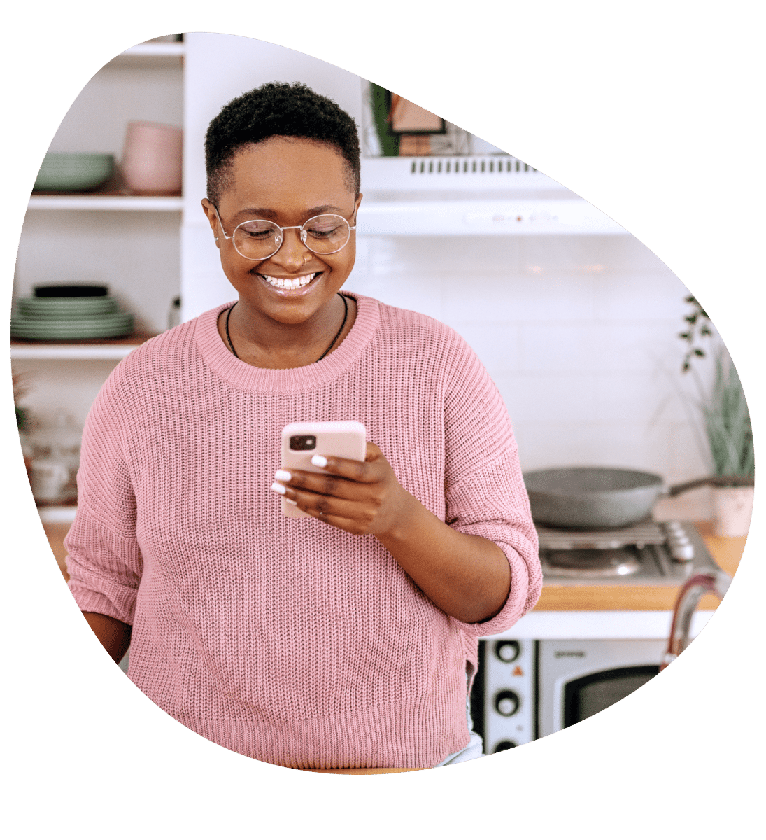 Patient smiling and looking at phone