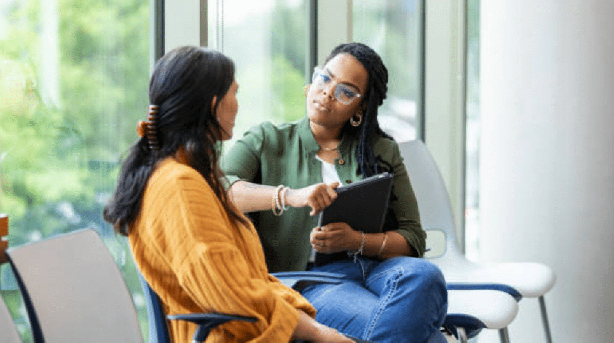 Two women talking