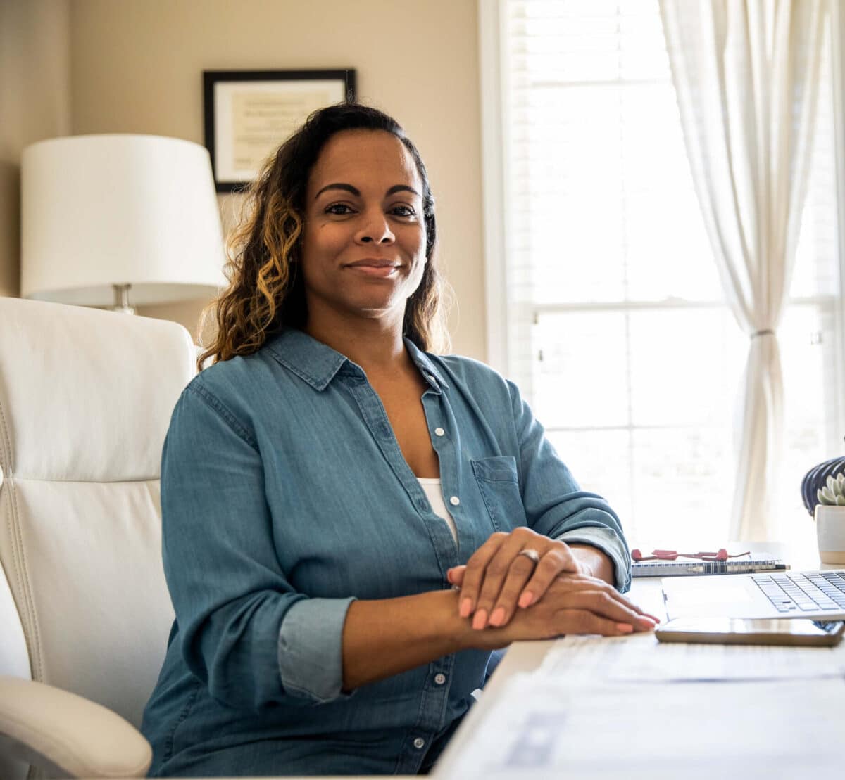 Woman at home office desk