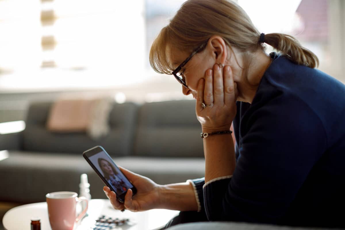 Woman on video call with doctor