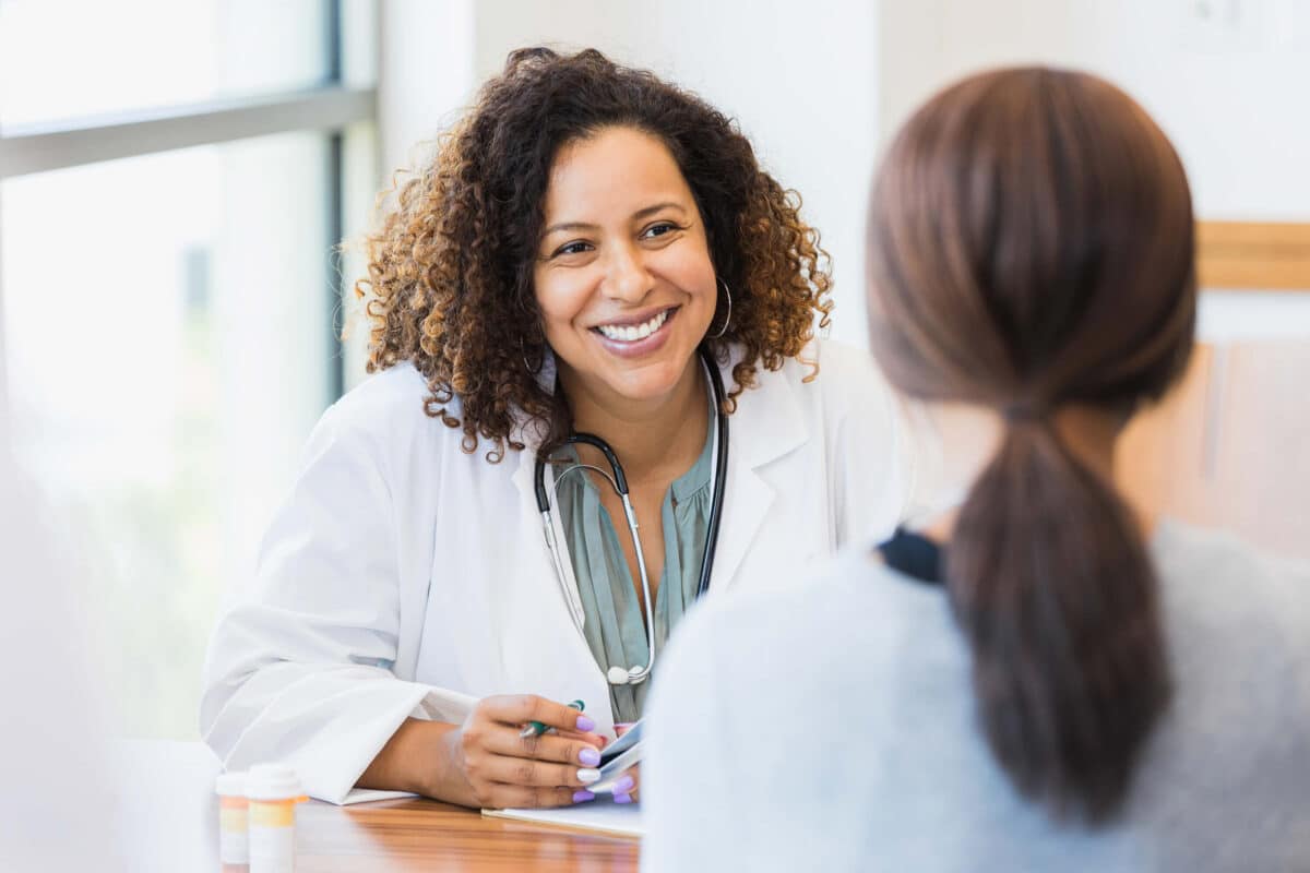 Doctor talking to patient